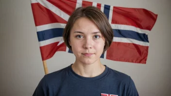 En person med etternavnet Moe, med et norsk flagg i bakgrunnen.