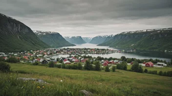 Et fredelig norsk landskap med en liten landsby eller by i bakgrunnen.