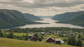 Et pittoreskt landskap av den norske landsbygda med en liten bosetning i det fjerne