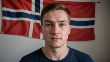 En person med etternavnet Preus, med et norsk flagg i bakgrunnen.