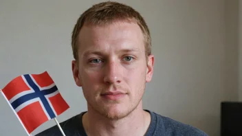 Et bilde av en person med etternavnet Prytz, med et norsk flagg i bakgrunnen.