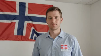En mann med en navnelapp som sier Gustafs, som representerer det norske navnet.